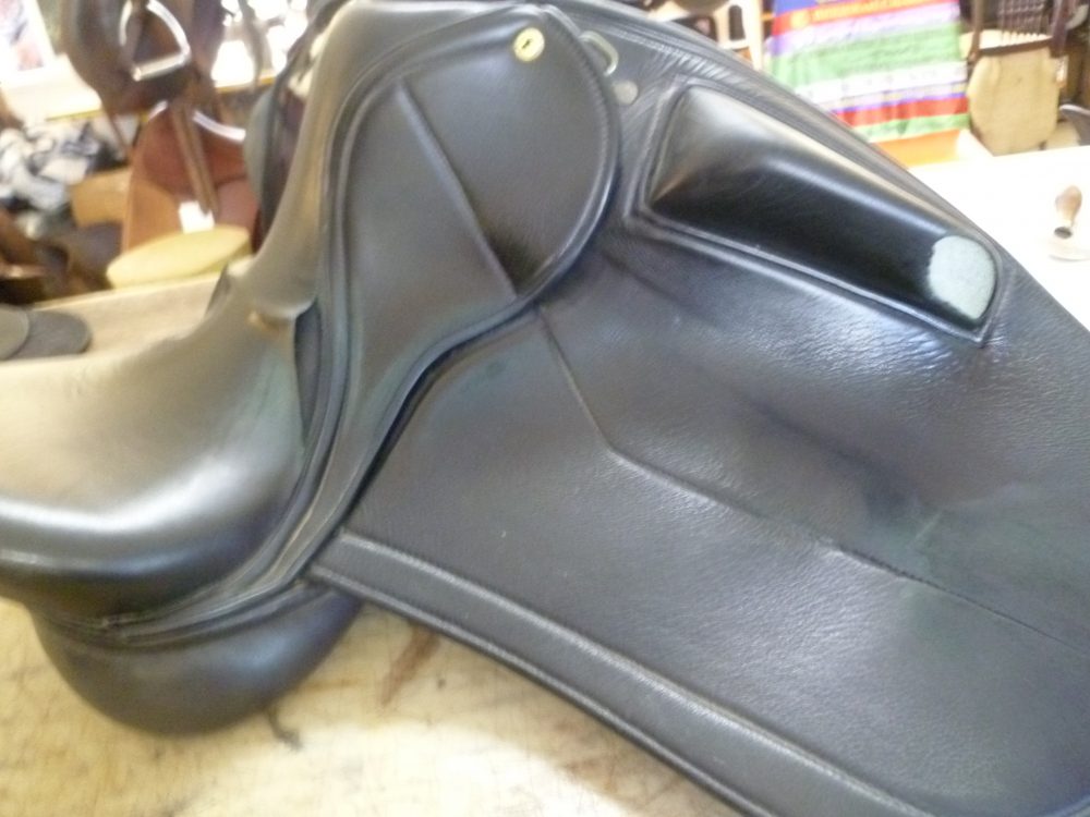 Black Dressage Saddle before restoration